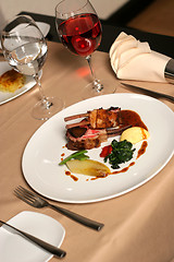 Image showing lamb meal and red wine
