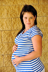 Image showing Young pregnant woman standing