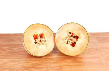 Image showing Two halve cantaloupes.