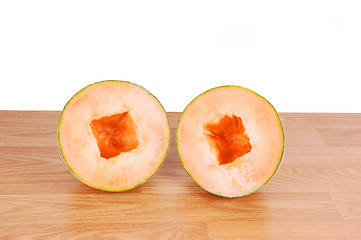 Image showing Two halve cantaloupes.