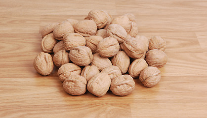 Image showing A pail of walnuts.