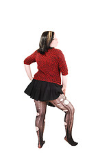 Image showing Girl with torn up pantyhose.