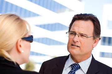 Image showing Businessman Talking with Female Colleague