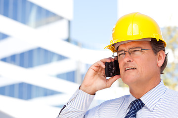 Image showing Contractor in Hardhat and Necktie Talks on His Cell Phone