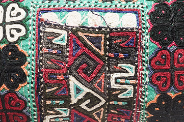 Image showing detail macro of hand made knitted turkish kilm handbag pattern h