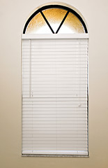 Image showing arched window closed blind