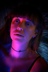 Image showing woman lit with red and blue