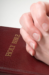 Image showing Praying Hands On Bible