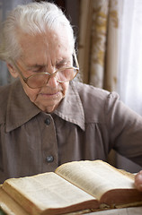 Image showing senior woman reading