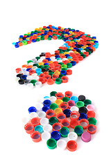 Image showing question from the plastic caps