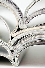 Image showing stack of colorful magazines
