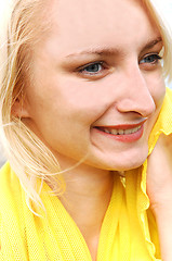 Image showing Pretty girl in yellow blouse.