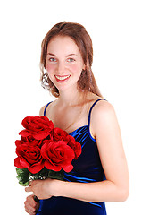 Image showing Pretty girl with red roses.