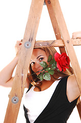 Image showing Pretty girl under the stepladder.