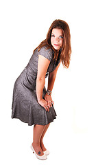 Image showing Pretty girl in gray dress.