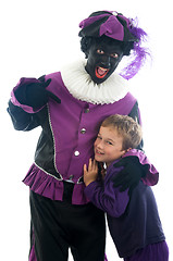 Image showing Zwarte Piet with child