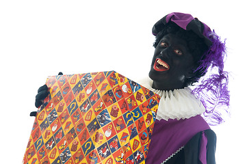 Image showing Zwarte Piet with present