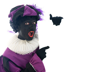 Image showing Zwarte Piet looking at a white board, to put your text in.