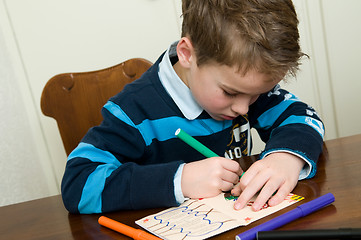 Image showing Writing And Drawing Boy