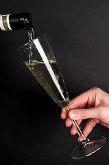 Image showing Filling A Champagne Glass