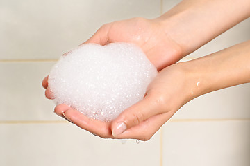 Image showing Soap suds in palms