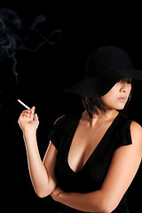 Image showing Posh smoking