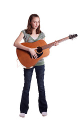 Image showing Serious Teen Playing Guitar