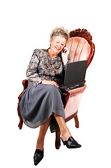 Image showing Business woman in armchair.