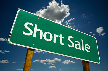 Image showing Short Sale Green Road Sign Over Clouds