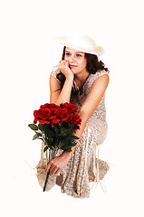 Image showing Woman with hat and roses.