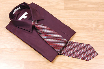 Image showing Burgundy dress shirt with tie.