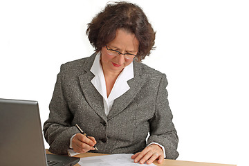 Image showing Woman is writng