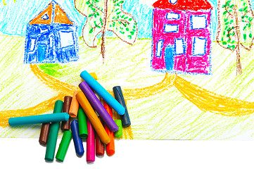 Image showing Wax crayons and a children's drawing.