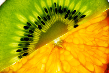 Image showing Sliced kiwi and mandarin