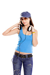 Image showing Young girl listen music