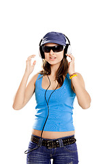 Image showing Young girl listen music