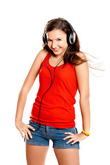 Image showing Young girl listen music