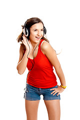 Image showing Young girl listen music