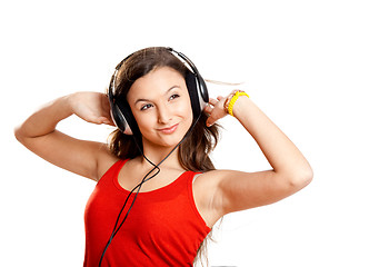 Image showing Young girl listen music