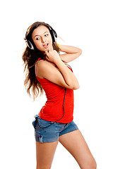 Image showing Young girl listen music