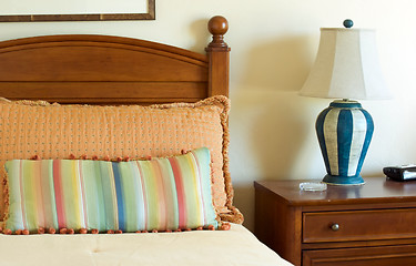 Image showing bedroom with striped pillows