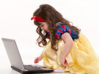 Image showing Young cute caucasian toddler girl playing 