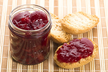 Image showing Breakfast of cherry jam on toast