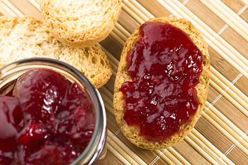 Image showing Breakfast of cherry jam on toast