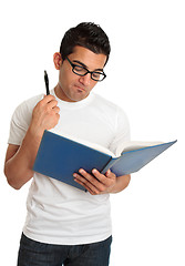 Image showing Man reading book and thinking