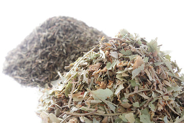 Image showing Two piles of herbs