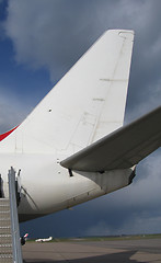 Image showing White tail fin of a airliner Boeing 737