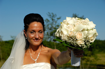 Image showing Bride with flower bouquet