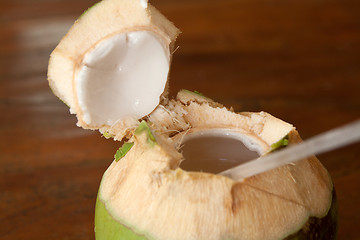 Image showing Open coconut with coco milk