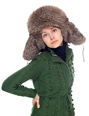 Image showing Beautiful girl in green sweater and fur hat